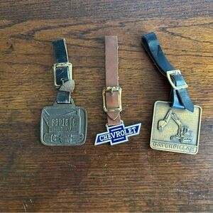Lot of 3 Vintage Watch Fobs Caterpillar Chevrolet and Santa Fe Equipment Co